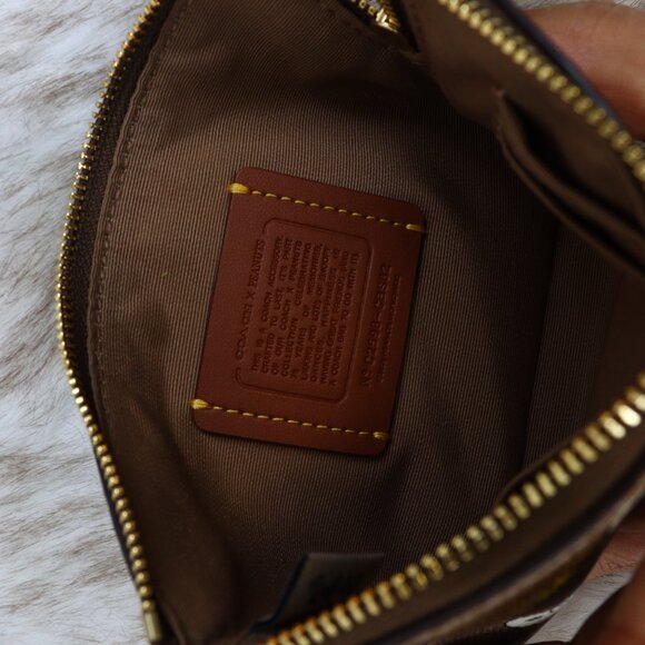 Coach x Peanuts Corner Zip Wristlet In Signature Canvas With Snoopy Print CBS82 - Picture 7 of 11